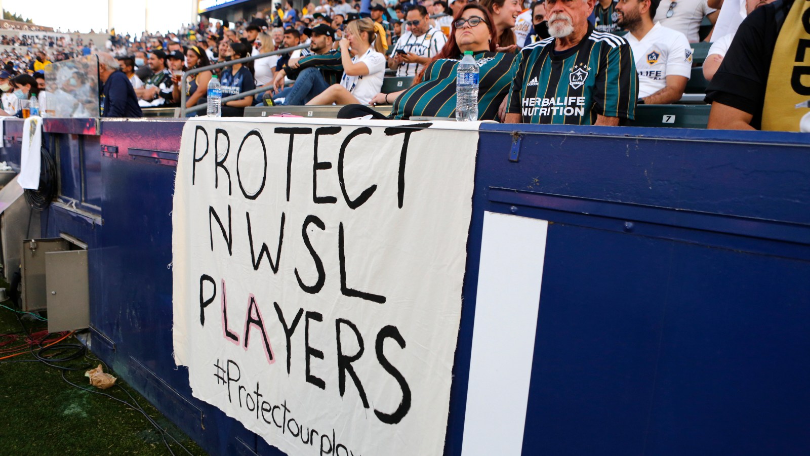 Protect our players sign at NWSL game